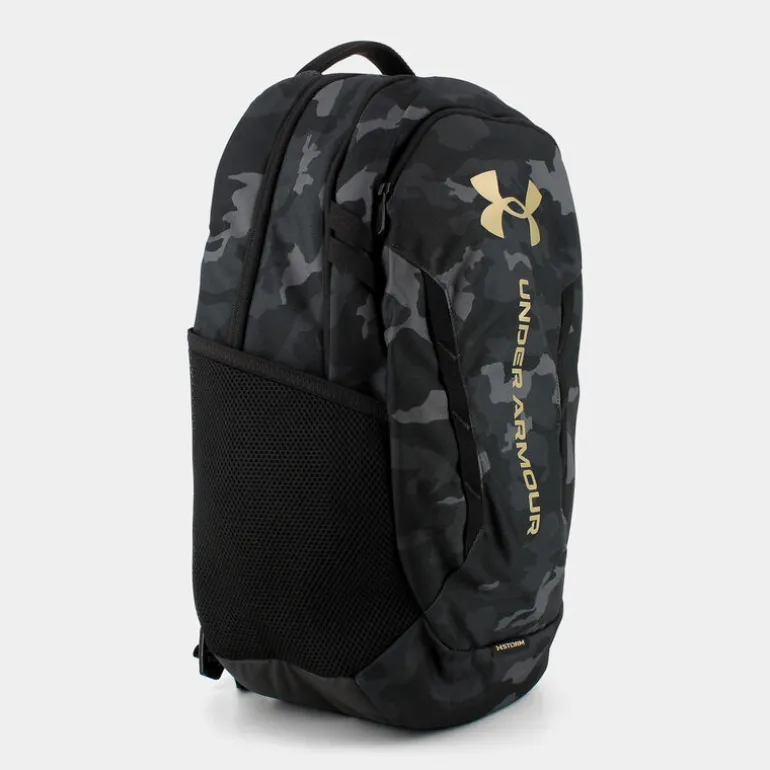 UA HUSTLE 6.0- ZAINI BLACK/METALLIC GOLD 1384672